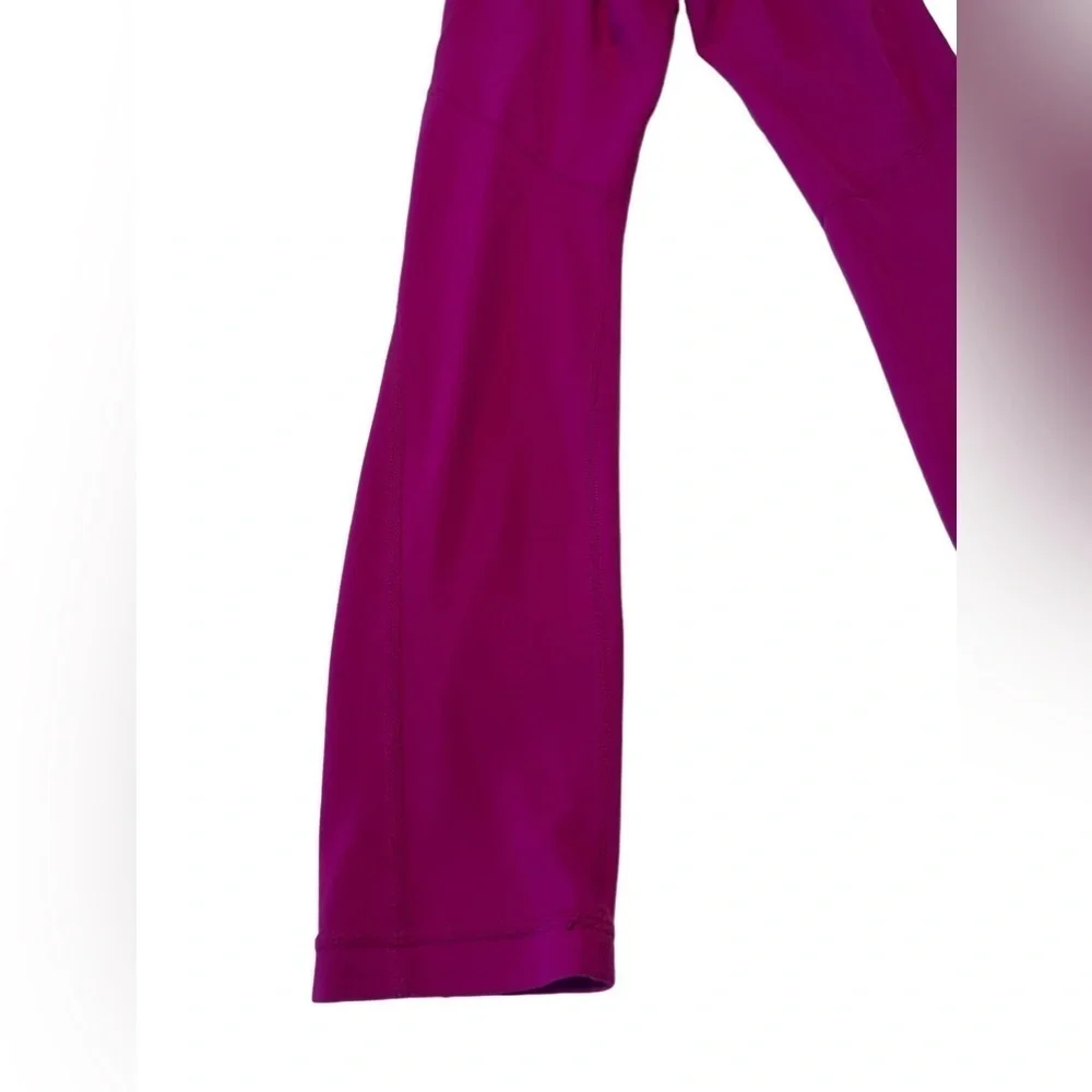Athleta Salutation Stash Tight